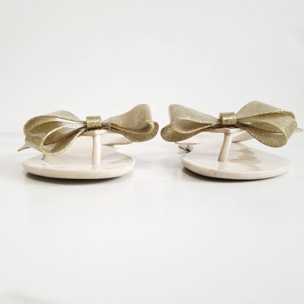 MEL by MELISSA Harmonic Gold Bow III Flip Flops - Picture 8 of 11